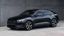 Various used electric cars parked in a row