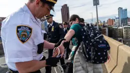 Journalists being arrested during a protest at a Minnesota church