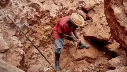 Rescue workers at Congo mine landslide site
