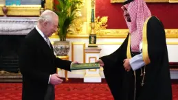 Prince Abdullah presenting credentials to King Charles