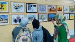 50 لوحة فنية في مترو القاهرة: معرض كاريكاتير عالمي