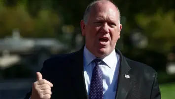 Tom Homan speaking at a press conference.