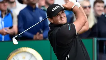 Patrick Reed playing golf