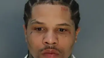 Gervonta Davis being escorted by police