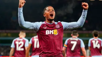 Jamaldeen Jimoh-Aloba celebrating with Aston Villa teammates