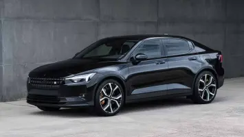 Various used electric cars parked in a row