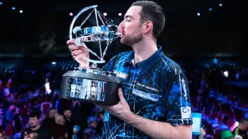 Luke Littler in action at the World Masters