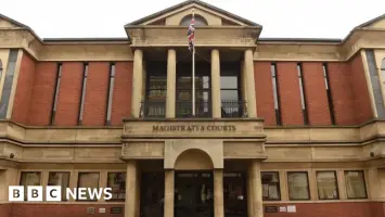 Courtroom with judge and defendant