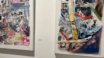 لوحة فنية في معرض «بين الأرض والشاهد»