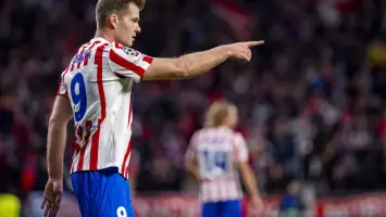 لاعبو أتلتيكو مدريد يحتفلون بالفوز على ريال بيتيس