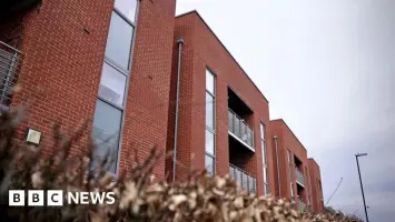 Empty retirement flat with for sale sign