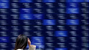 تقلبات حادة تضرب وول ستريت والمعادن النفيسة والعملات الرقمية