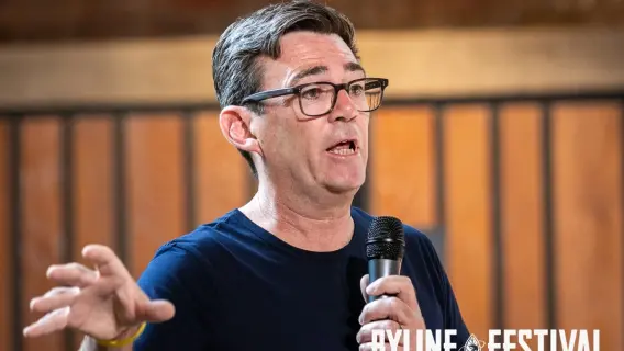 Andy Burnham addressing the media