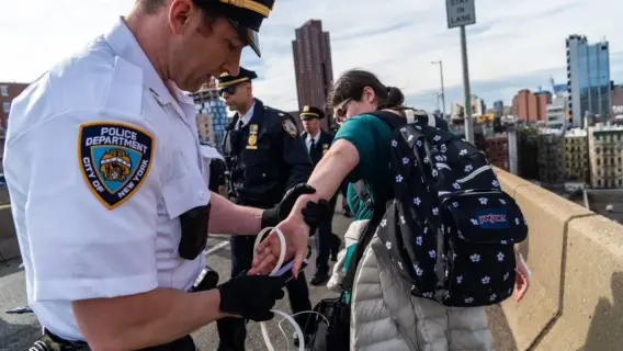 Journalists being arrested during a protest at a Minnesota church