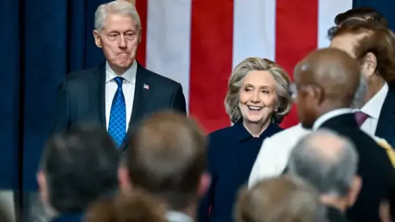 Bill and Hillary Clinton addressing a congressional committee