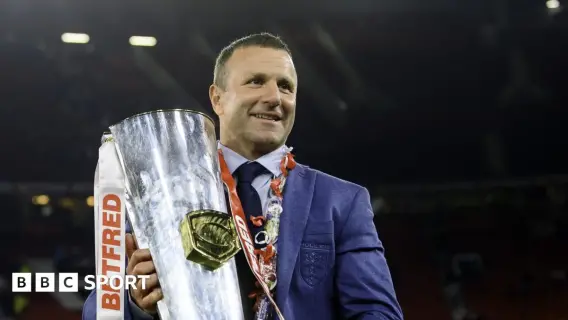 Willie Peters looking thoughtful at a rugby match.